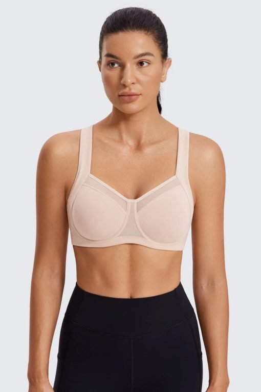 Modeling wearing beige Adjustable Straps High Impact Sports Bra with Underwire